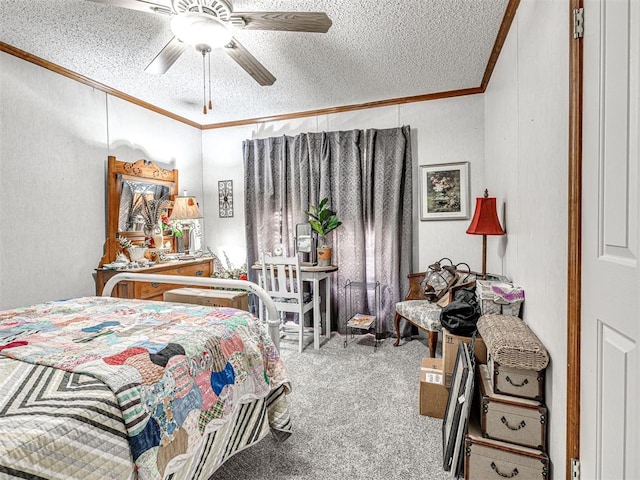 19519 N 2730th Rd, Kingfisher, OK 73750 - bedroom with crown molding, a textured ceiling, carpet flooring, and a ceiling fan