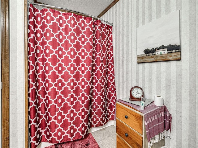 19519 N 2730th Rd, Kingfisher, OK 73750 - bathroom featuring wallpapered walls, tile patterned flooring, a textured ceiling, and ornamental molding