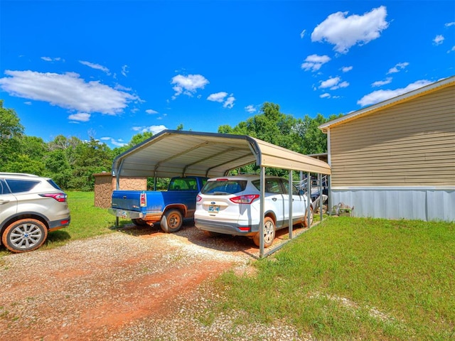 19519 N 2730th Rd, Kingfisher, OK 73750 - view of car parking with a detached carport and driveway