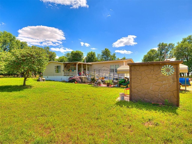 19519 N 2730th Rd, Kingfisher, OK 73750 - rear view of house featuring a lawn