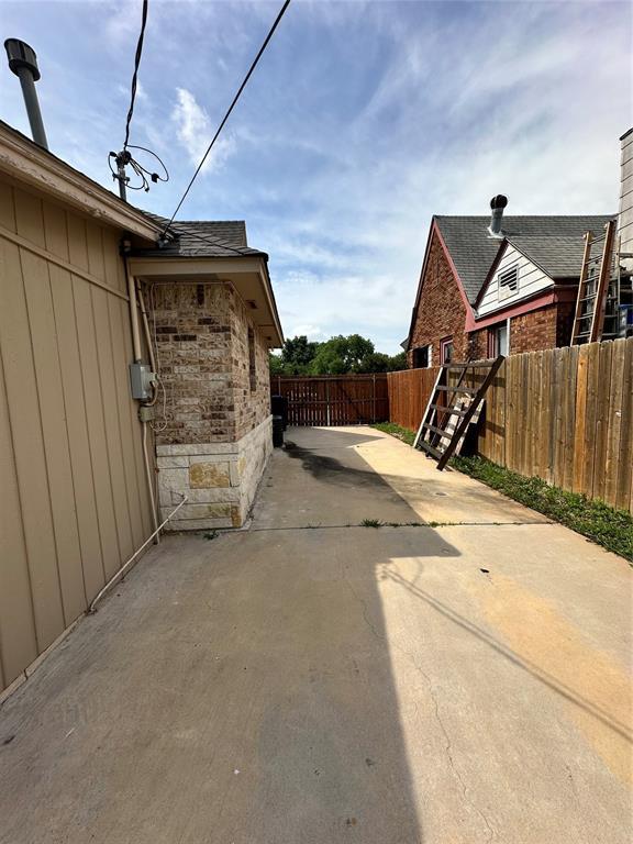 327 SW Grand Blvd, Oklahoma City, OK 73109 - view of patio / terrace featuring concrete driveway