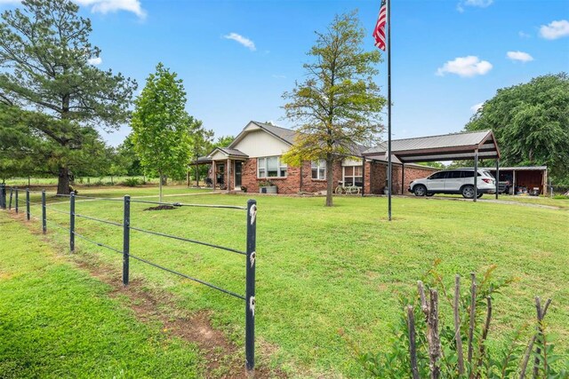 26114 State Highway 19, Cyril, OK 73029 - ranch-style home with brick siding and a carport