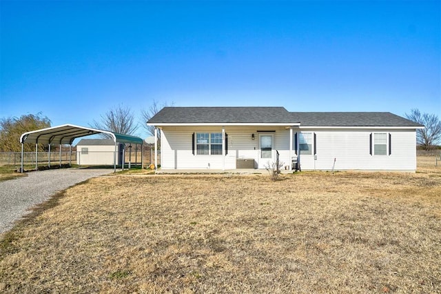 122 Cotton Tail Dr, Shawnee, OK 74804 - single story home featuring driveway, a carport, and covered porch