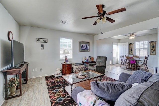 122 Cotton Tail Dr, Shawnee, OK 74804 - living room with ceiling fan and light wood finished floors