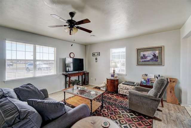 122 Cotton Tail Dr, Shawnee, OK 74804 - living area featuring light wood-style floors and a ceiling fan