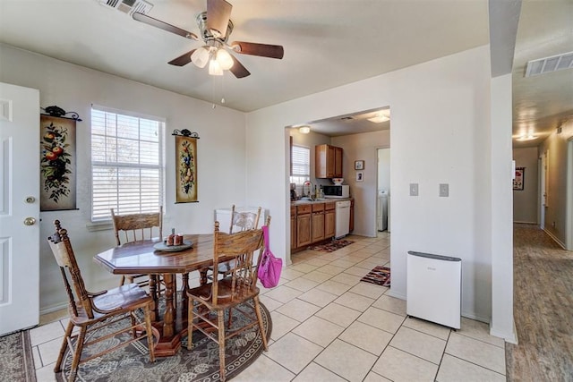 122 Cotton Tail Dr, Shawnee, OK 74804 - dining space featuring ceiling fan and light tile patterned floors