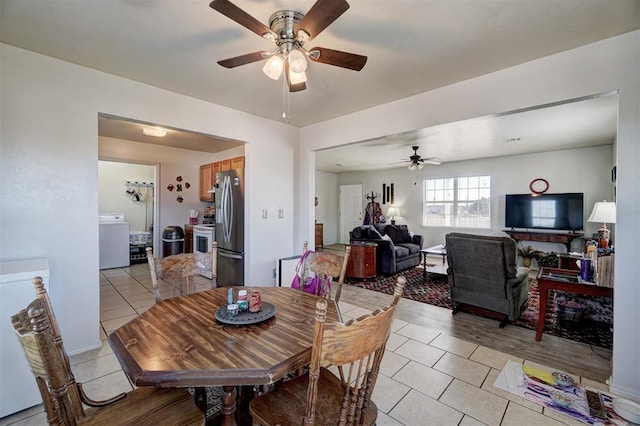 122 Cotton Tail Dr, Shawnee, OK 74804 - dining space featuring washer / dryer, a ceiling fan, and light tile patterned floors