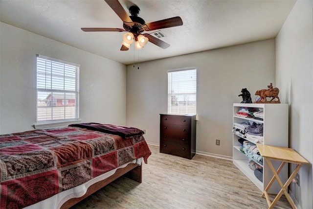 122 Cotton Tail Dr, Shawnee, OK 74804 - bedroom with wood finished floors and a ceiling fan