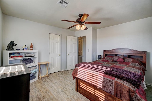 122 Cotton Tail Dr, Shawnee, OK 74804 - bedroom with wood finished floors and a ceiling fan