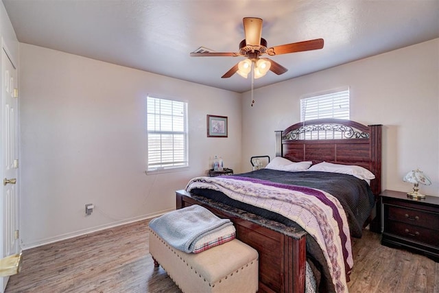 122 Cotton Tail Dr, Shawnee, OK 74804 - bedroom with wood finished floors and ceiling fan