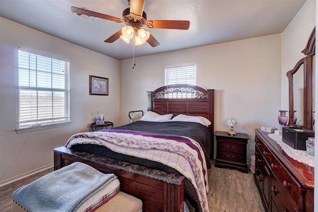 122 Cotton Tail Dr, Shawnee, OK 74804 - bedroom with wood finished floors and a ceiling fan