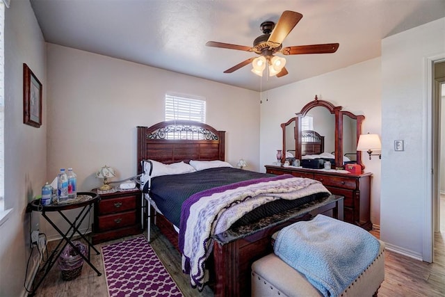 122 Cotton Tail Dr, Shawnee, OK 74804 - bedroom featuring wood finished floors and ceiling fan
