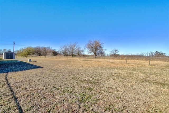 122 Cotton Tail Dr, Shawnee, OK 74804 - view of yard featuring a storage shed and a rural view