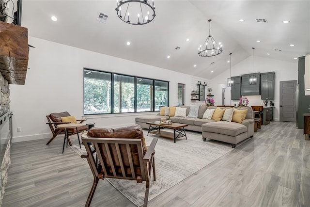 118289 S 4215th Rd, Eufaula, OK 74432 - living area featuring a chandelier, light wood-type flooring, high vaulted ceiling, recessed lighting, and baseboards