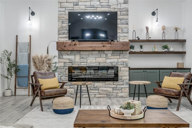 118289 S 4215th Rd, Eufaula, OK 74432 - living area featuring wood finished floors and a stone fireplace