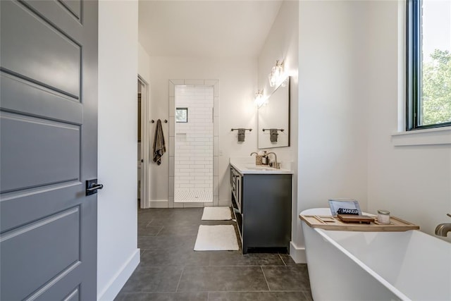 118289 S 4215th Rd, Eufaula, OK 74432 - full bathroom featuring vanity, tile patterned floors, a tile shower, a freestanding tub, and baseboards