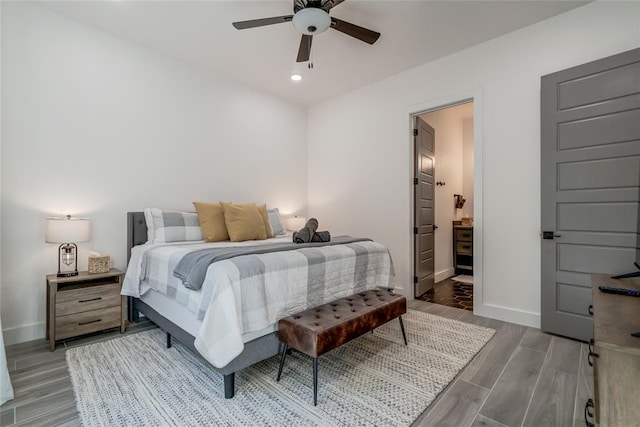118289 S 4215th Rd, Eufaula, OK 74432 - bedroom with baseboards, recessed lighting, wood finished floors, a ceiling fan, and ensuite bath