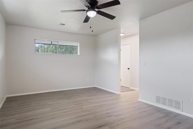 444 NW 86th St, Oklahoma City, OK 73114 - empty room featuring baseboards, wood finished floors, and ceiling fan