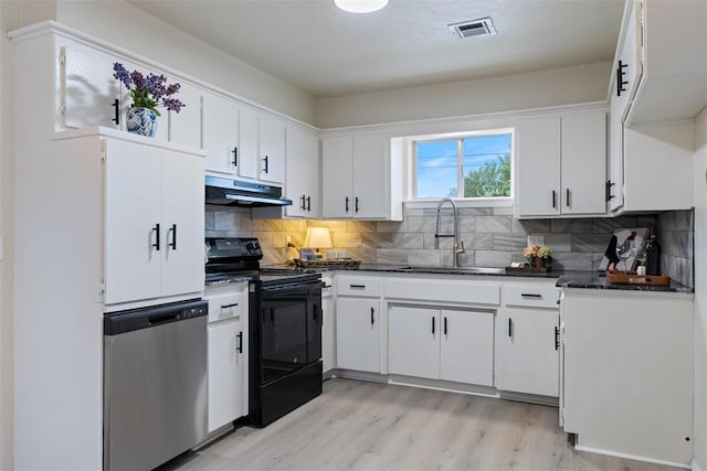 444 NW 86th St, Oklahoma City, OK 73114 - kitchen with black electric range, under cabinet range hood, dishwasher, a sink, and light wood finished floors