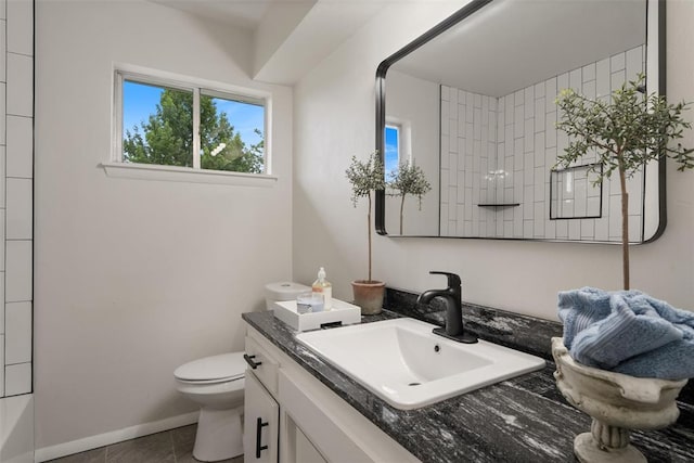 444 NW 86th St, Oklahoma City, OK 73114 - bathroom featuring toilet, vanity, healthy amount of natural light, and tile patterned flooring