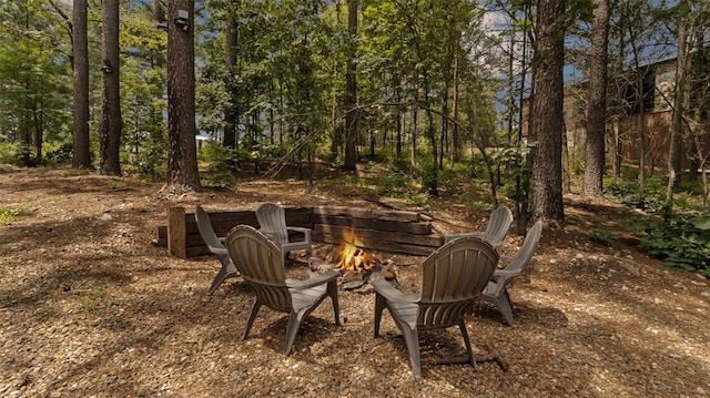 136 Gnarly Maple Trl, Broken Bow, OK 74728 - view of yard with an outdoor fire pit