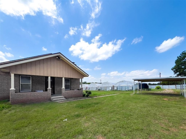 8701 Cornforth Rd, Guthrie, OK 73044 - view of yard with a carport