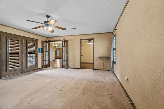 720 W 3rd St, Watonga, OK 73772 - unfurnished bedroom featuring carpet flooring, a textured wall, baseboards, ornamental molding, and a chandelier