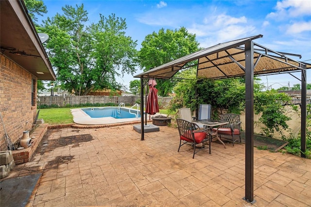 720 W 3rd St, Watonga, OK 73772 - fenced backyard with a gazebo, a patio area, and outdoor dining area