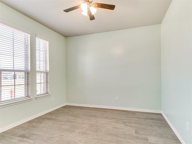 9708 Squire Ln, Yukon, OK 73099 - spare room with light wood-style floors and a ceiling fan