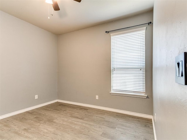 9708 Squire Ln, Yukon, OK 73099 - unfurnished room with wood finished floors and ceiling fan