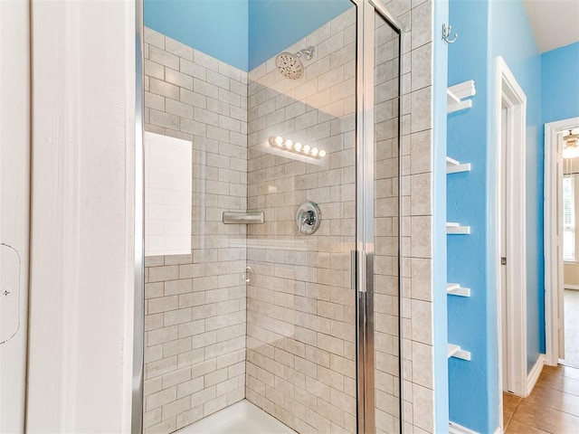 9708 Squire Ln, Yukon, OK 73099 - full bathroom featuring a shower stall and tile patterned flooring