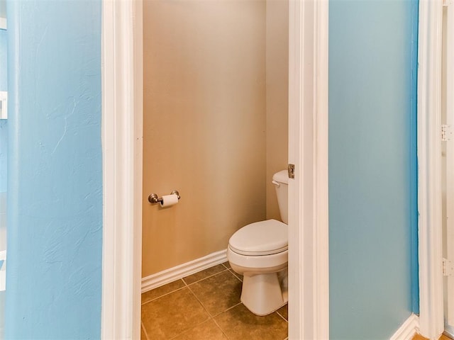 9708 Squire Ln, Yukon, OK 73099 - bathroom with tile patterned flooring and toilet