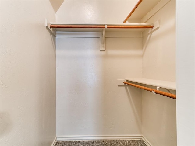 9708 Squire Ln, Yukon, OK 73099 - walk in closet featuring carpet floors