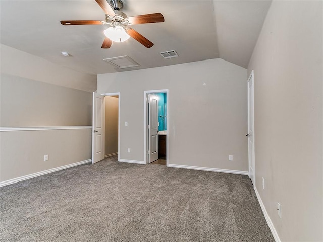 9708 Squire Ln, Yukon, OK 73099 - unfurnished bedroom featuring lofted ceiling, carpet flooring, ceiling fan, ensuite bathroom, and attic access