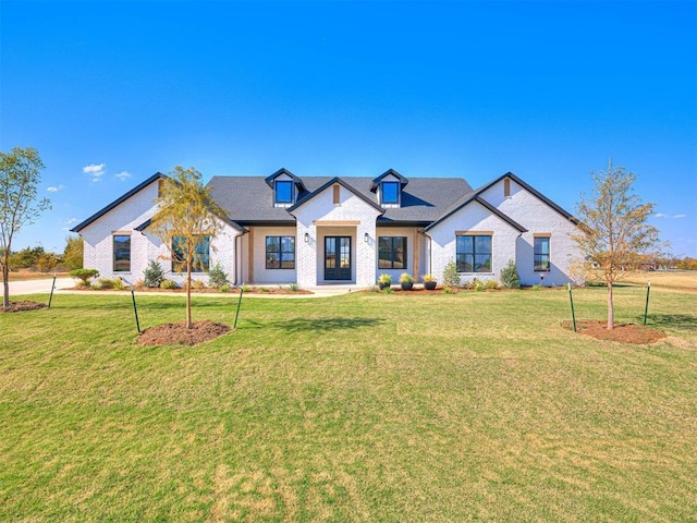 13133 Ashlyn Ln, Yukon, OK 73099 - modern farmhouse with a front lawn and brick siding