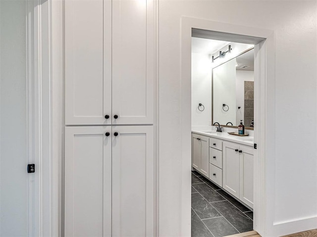 13133 Ashlyn Ln, Yukon, OK 73099 - bathroom with marble finish flooring and double vanity