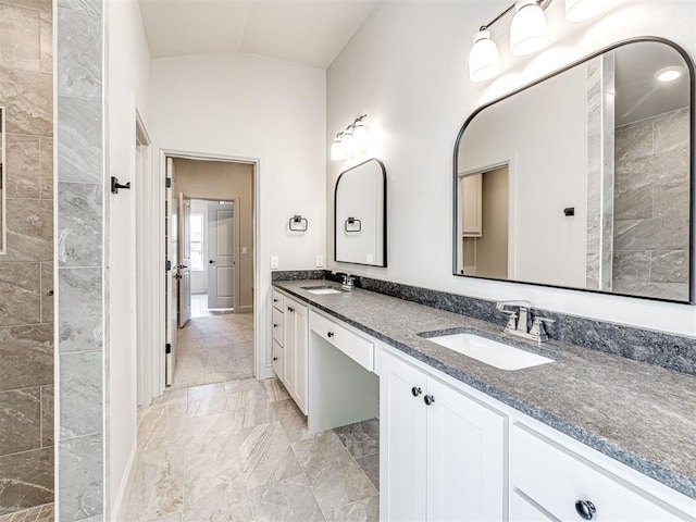 9608 Sultans Water Way, Yukon, OK 73099 - full bathroom featuring marble finish flooring, double vanity, and lofted ceiling