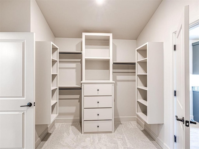 9608 Sultans Water Way, Yukon, OK 73099 - walk in closet with light colored carpet
