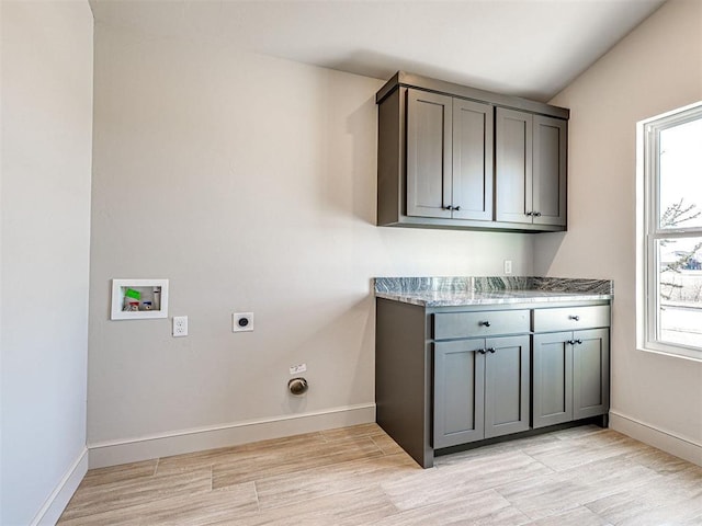 9608 Sultans Water Way, Yukon, OK 73099 - laundry room featuring electric dryer hookup, hookup for a washing machine, cabinet space, and baseboards