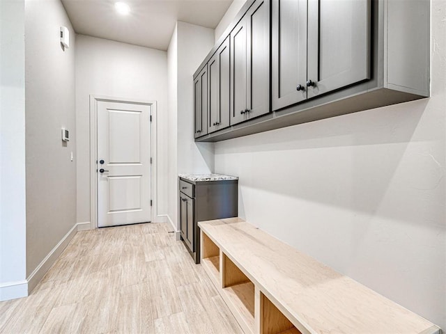 9608 Sultans Water Way, Yukon, OK 73099 - mudroom with baseboards, light wood-type flooring, and recessed lighting