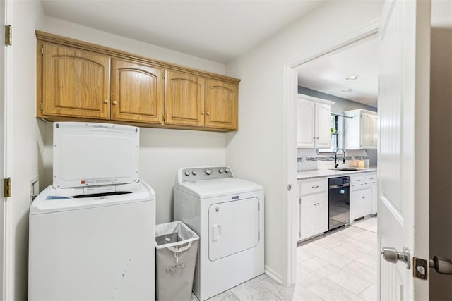 7921 NW 40th St, Bethany, OK 73008 - laundry room with washing machine and clothes dryer, cabinet space, and recessed lighting