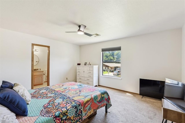 7921 NW 40th St, Bethany, OK 73008 - bedroom featuring carpet flooring, a ceiling fan, and ensuite bath