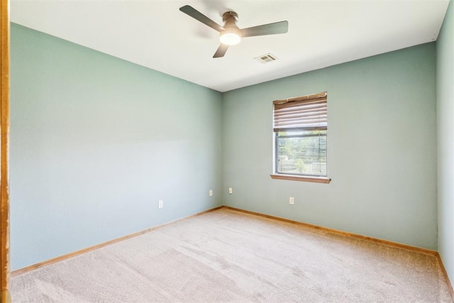 7921 NW 40th St, Bethany, OK 73008 - carpeted spare room with a ceiling fan and baseboards