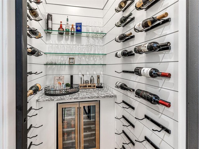 15825 Lacebark Ln, Edmond, OK 73013 - wine area featuring beverage cooler and a bar