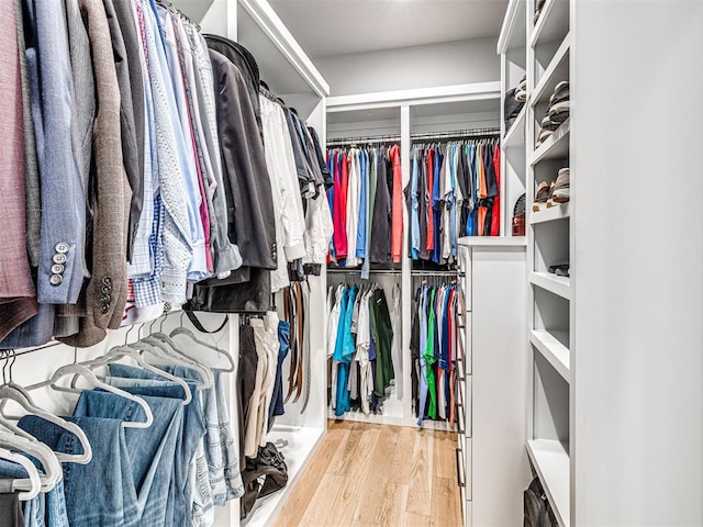 15825 Lacebark Ln, Edmond, OK 73013 - spacious closet featuring wood finished floors