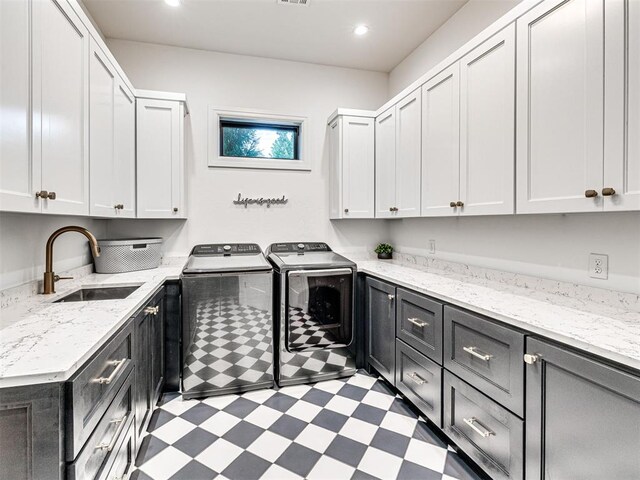 15825 Lacebark Ln, Edmond, OK 73013 - laundry room featuring cabinet space, washer and dryer, light flooring, and recessed lighting
