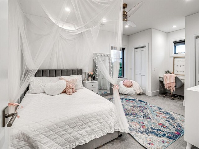 15825 Lacebark Ln, Edmond, OK 73013 - bedroom with carpet, a ceiling fan, an office area, and a closet