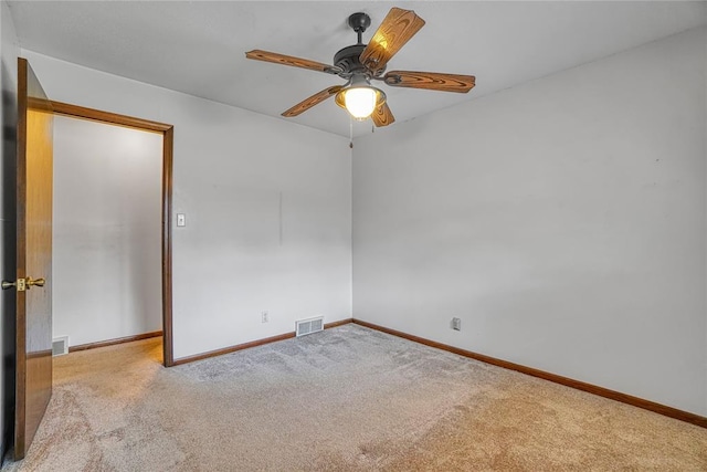 1909 N Flamingo Ln, Altus, OK 73521 - carpeted empty room with baseboards and ceiling fan