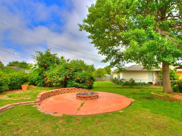 1505 W Blake St, El Reno, OK 73036 - view of yard featuring an outdoor fire pit and a patio