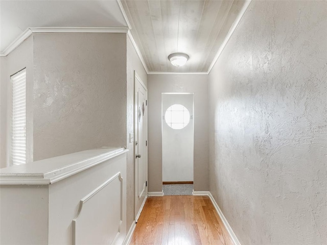 1505 W Blake St, El Reno, OK 73036 - entryway with light wood-type flooring, crown molding, and baseboards